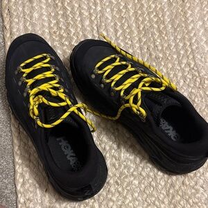 Hoka Athletic Shoes in Black with Yellow Laces